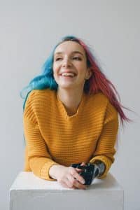 Multicolor hair person smiling