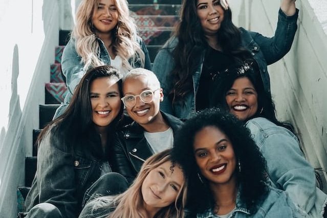 Group of friends sitting on the stairs