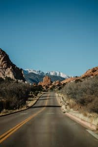 Photo of a road cutting through the rocks in Colorado